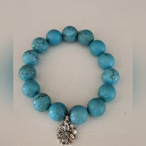 Blue Howlite 14mm Bead Stretch Bracelet With Silver Flower Dangle Charm